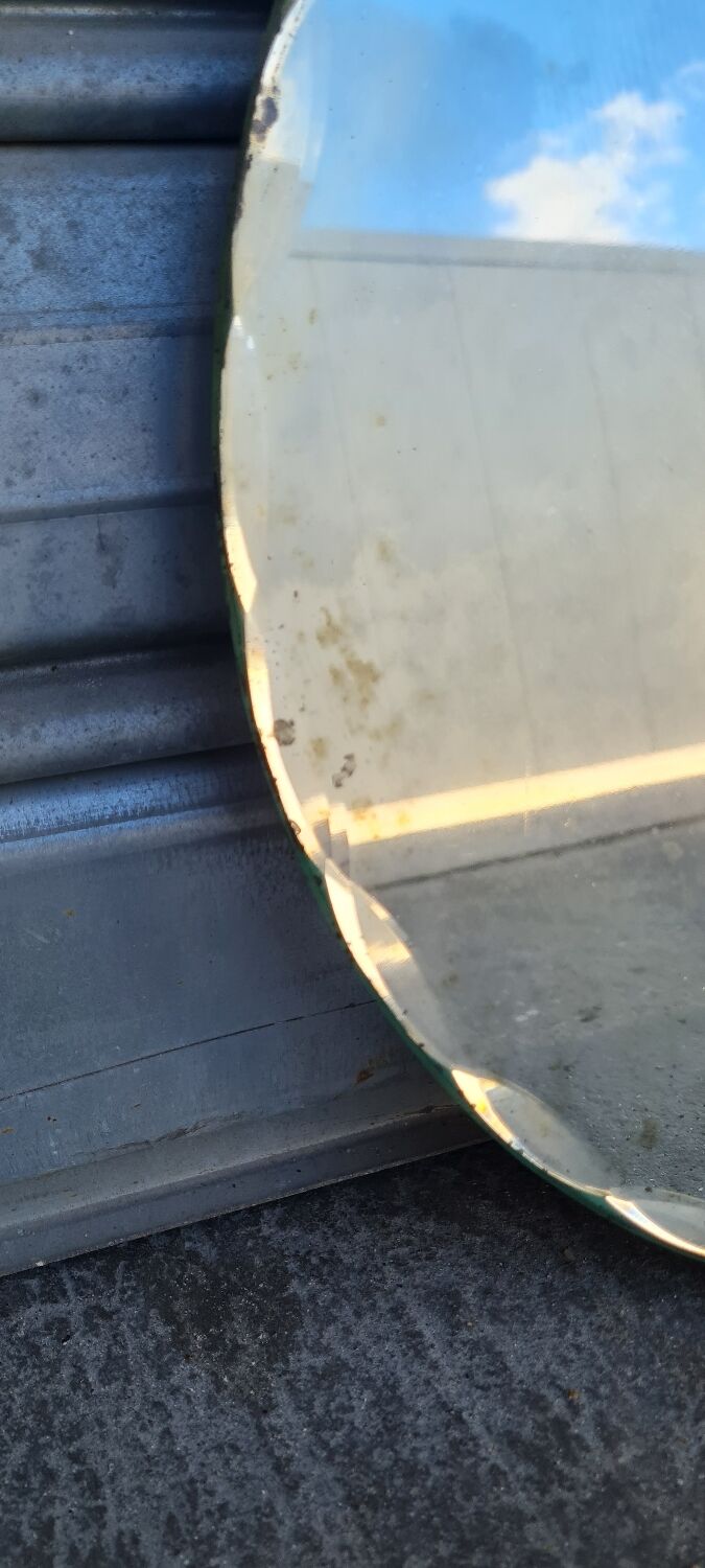 Beveled round mirror