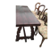 19th-century brown walnut dining table with sculpted trestle legs.