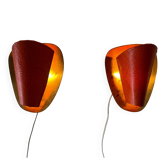 Pair of orange plexiglass and curved brass wall lights, 1950s, Germany