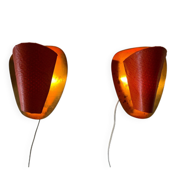 Pair of orange plexiglass and curved brass wall lights, 1950s, Germany