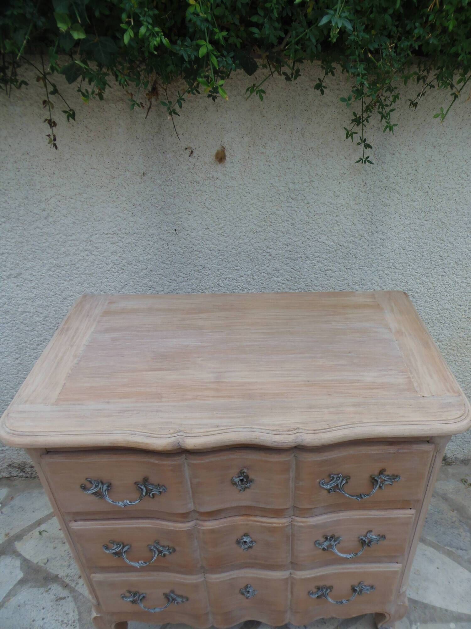Beautifully crafted Louis XVI style commode in bleached wood.