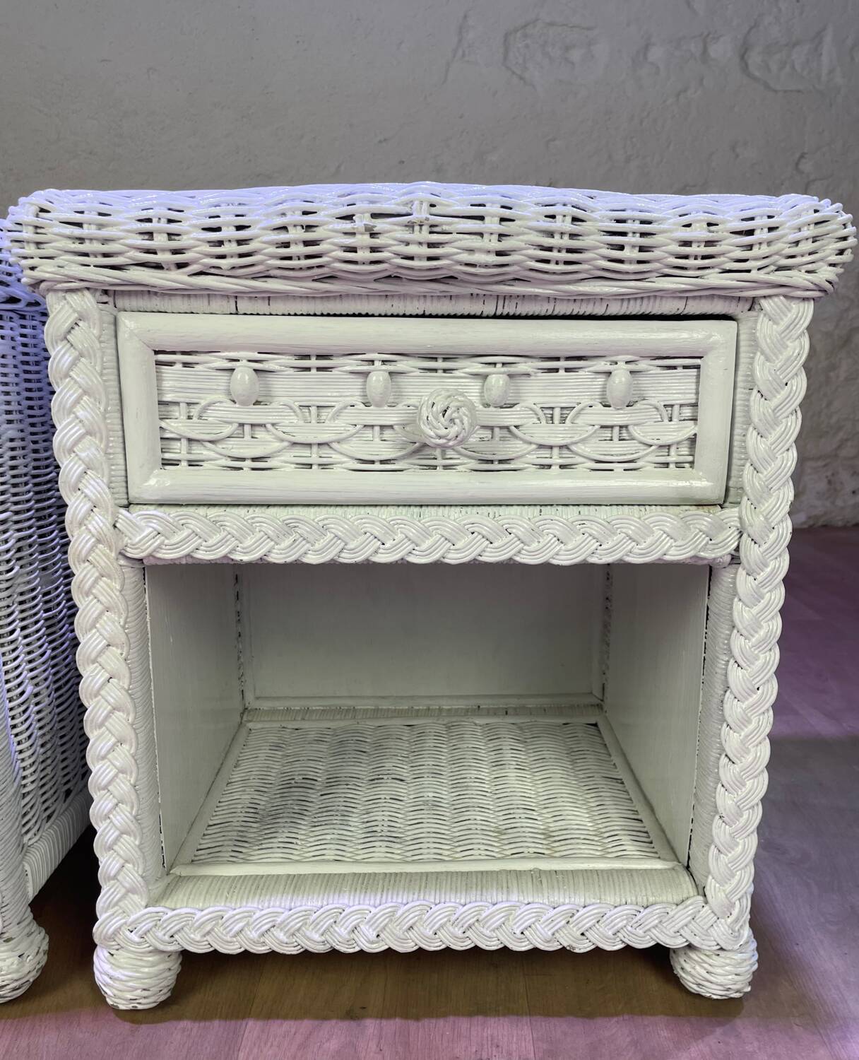 Pair of white lacquered rattan bedside tables