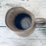 Pitcher in old sandstone