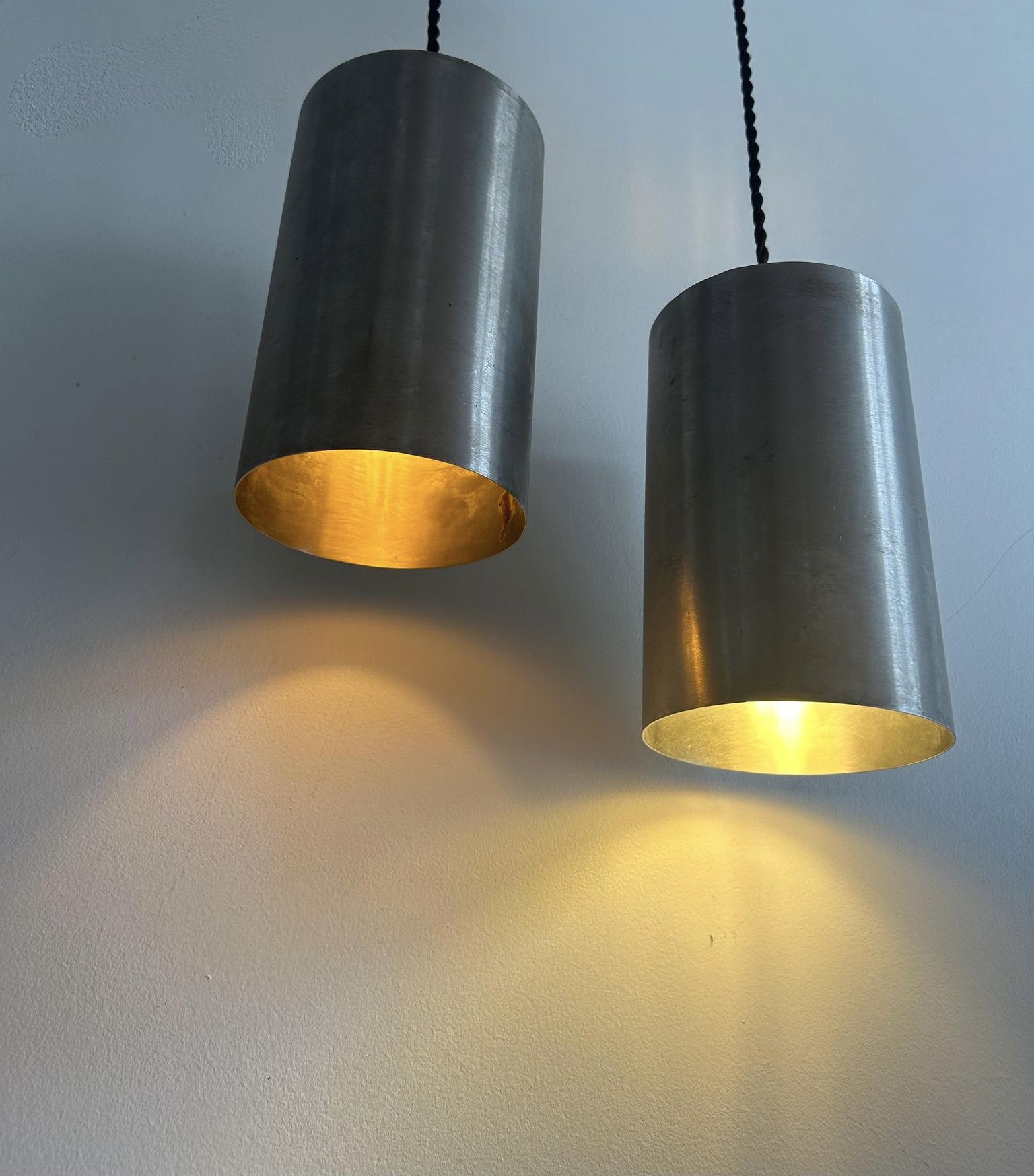 Pair of vintage brushed metal pendant lamps, France 1960