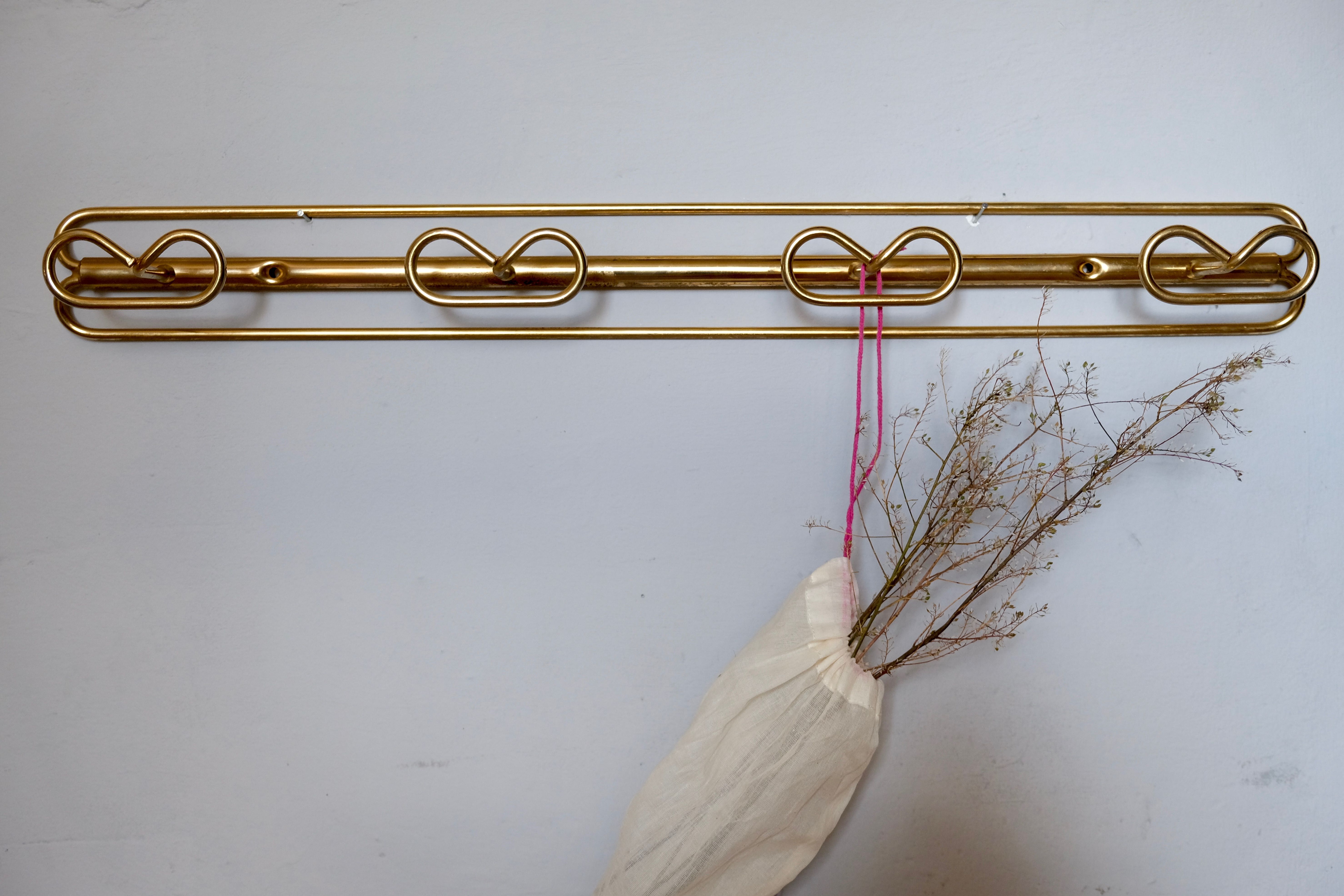 Patère en métal doré des années 50