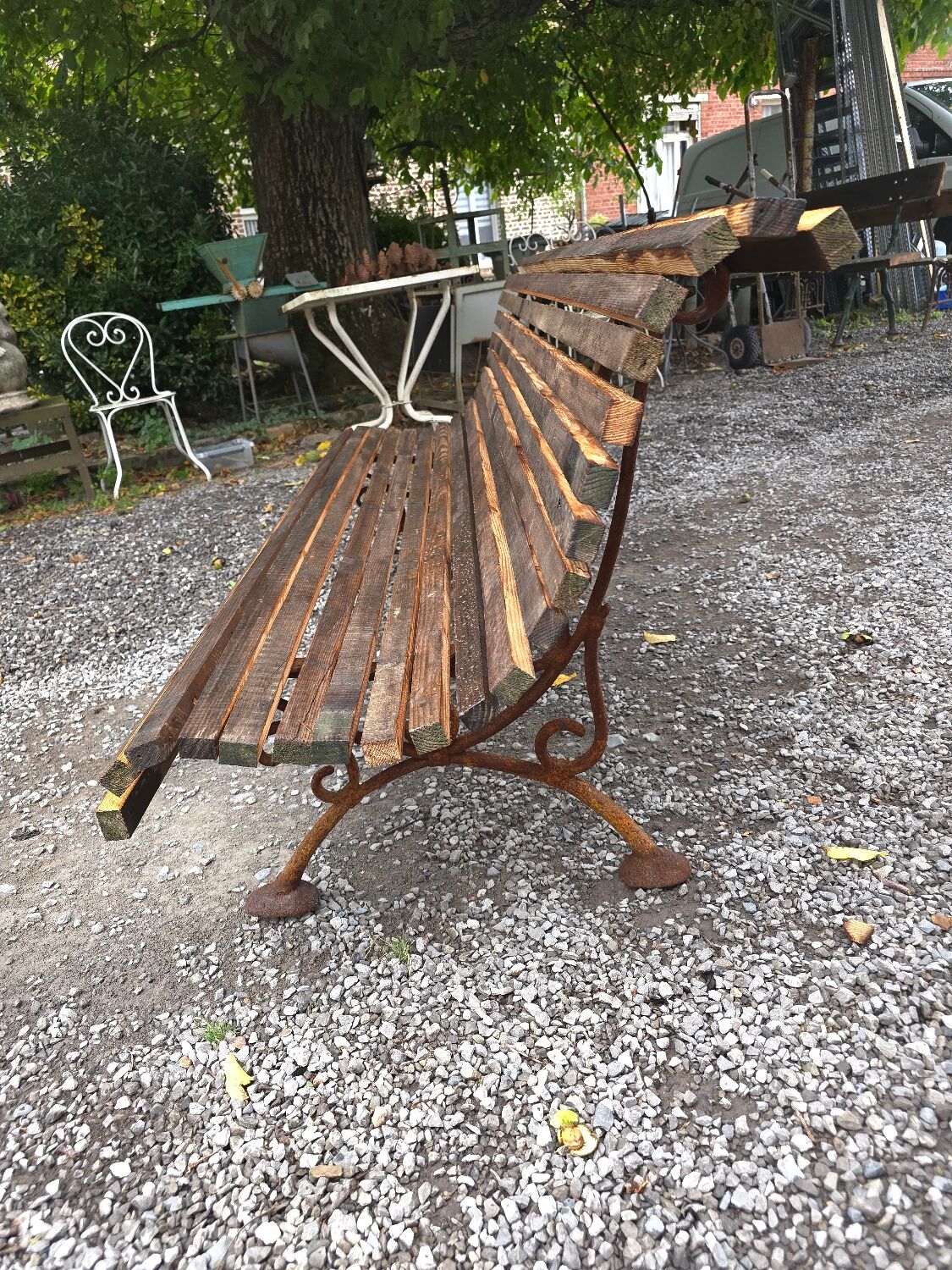 Cast iron garden bench with wooden slats