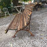 Cast iron garden bench with wooden slats