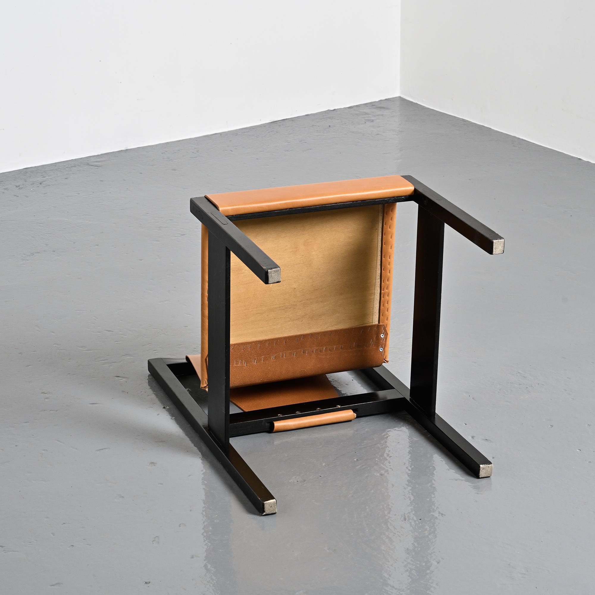 Set of black lacquered wooden chairs with leather, Swiss architect's work, 1980s.