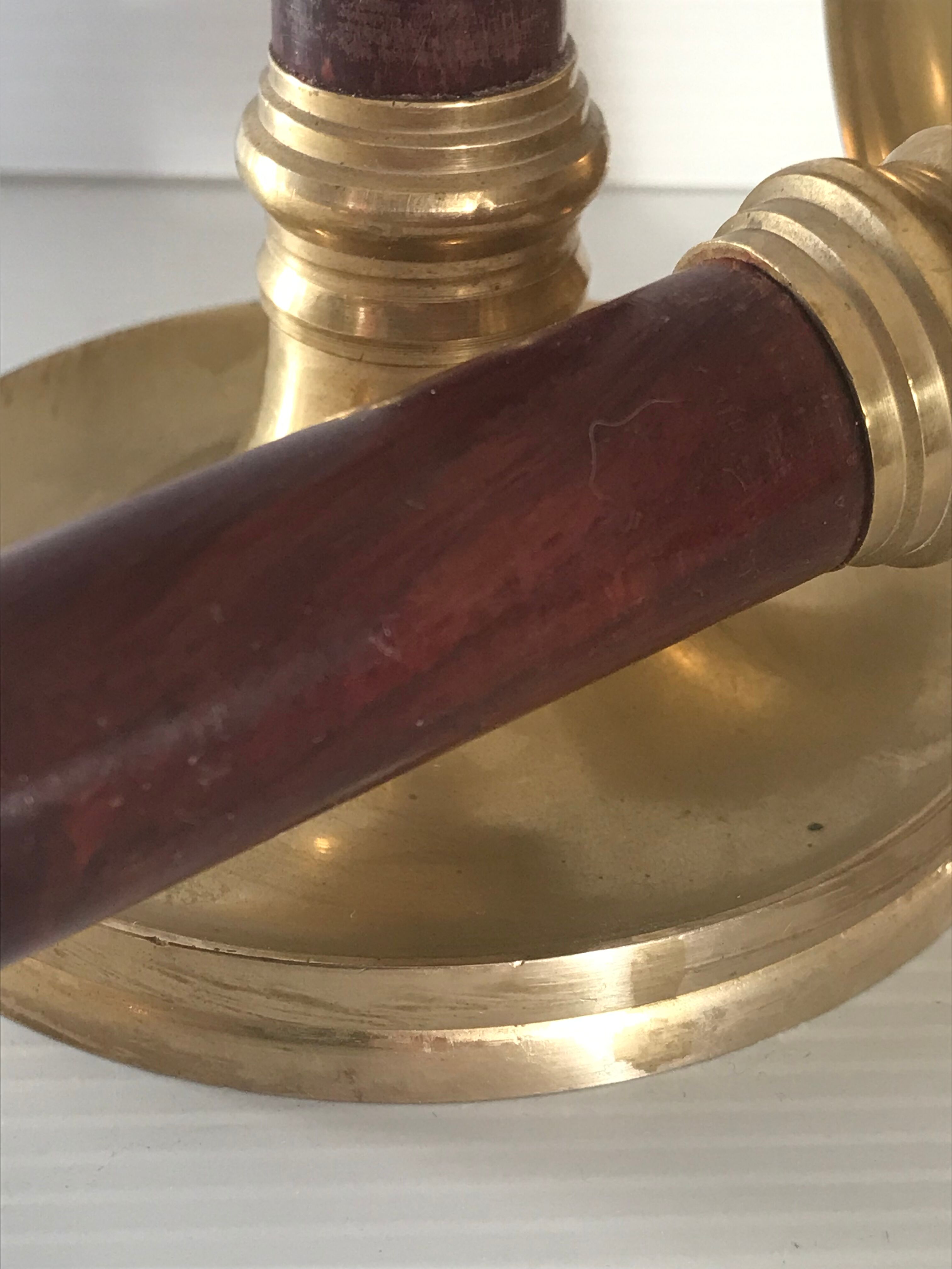 Pair of Scandinavian brass and teak candle holders