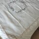 Antique linen tablecloth embroidered with flowers