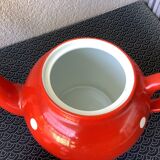 Vintage red teapot with white polka dots