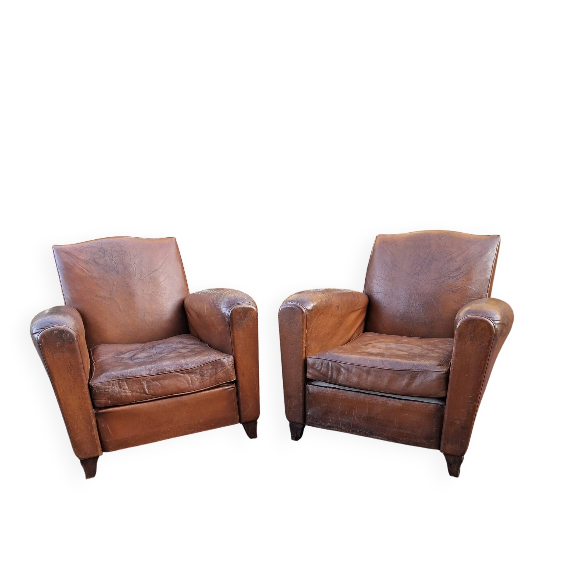 A couple of pairs of genuine restored club armchairs in industrial loft leather.