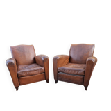 A couple of pairs of genuine restored club armchairs in industrial loft leather.