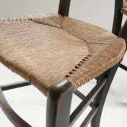 Pair of antique Northern French black-stained chairs with rush seats