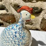 Signed ceramic hen and guinea fowl