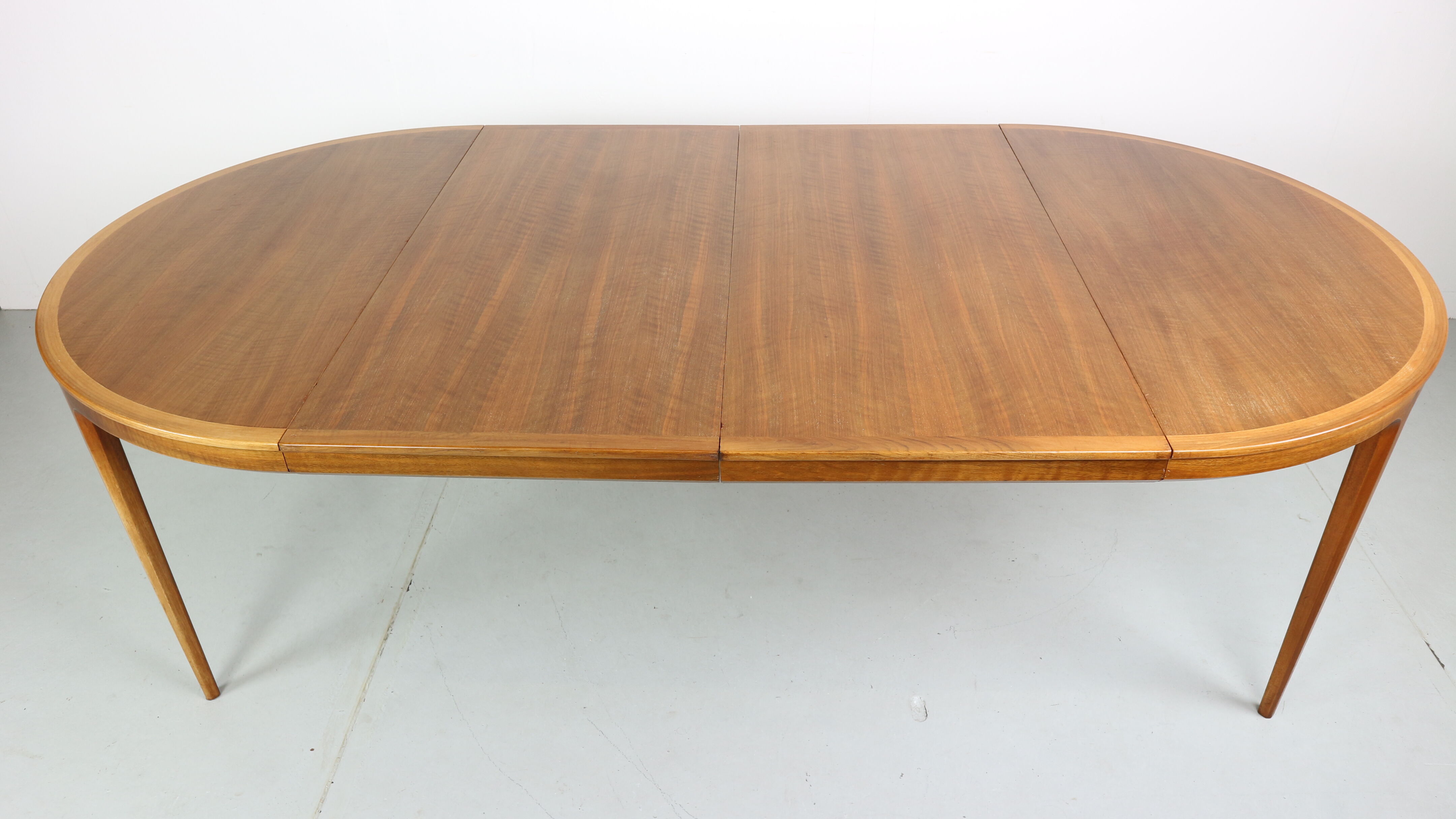 Swedish walnut dining table by B. Fridhagen for Bodafors, 1960s