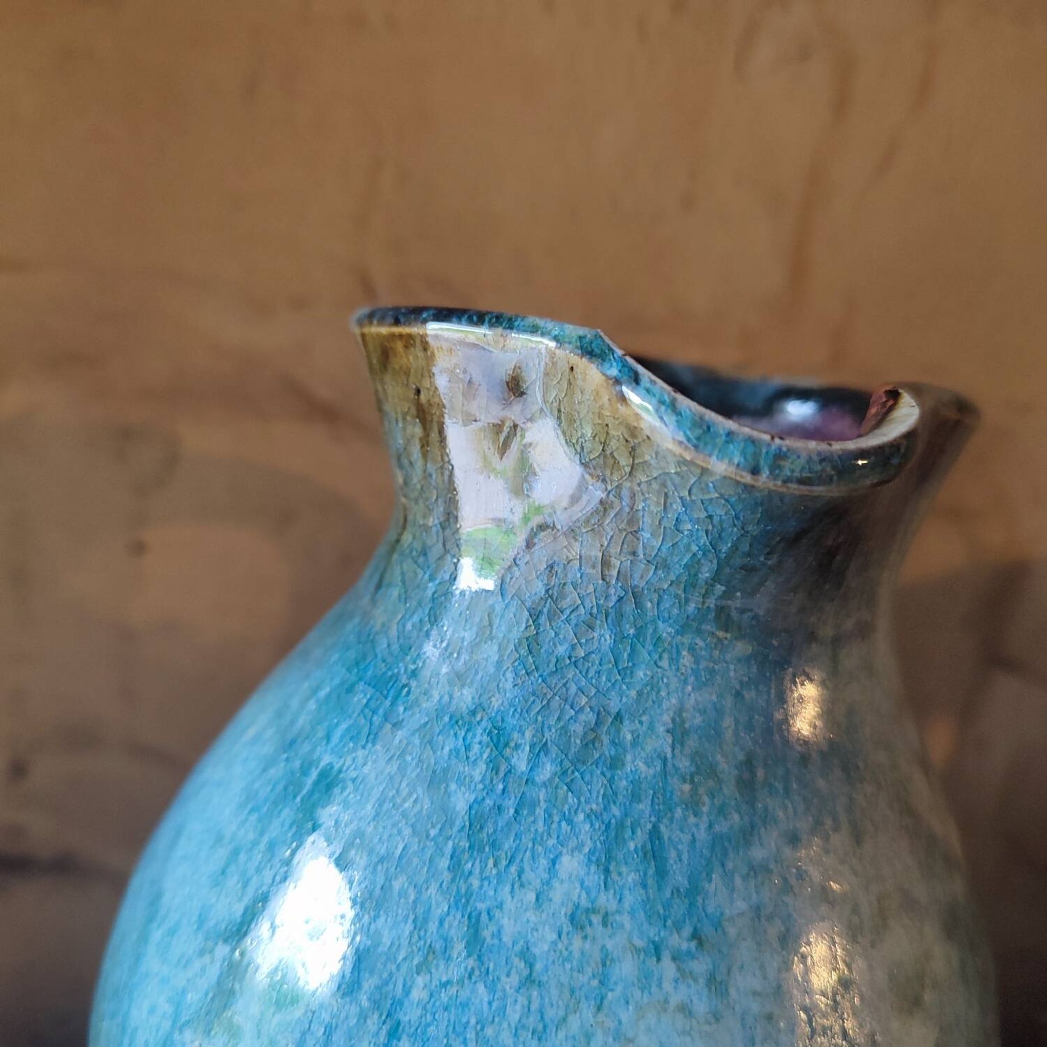 Blue crackle glaze stoneware pitcher