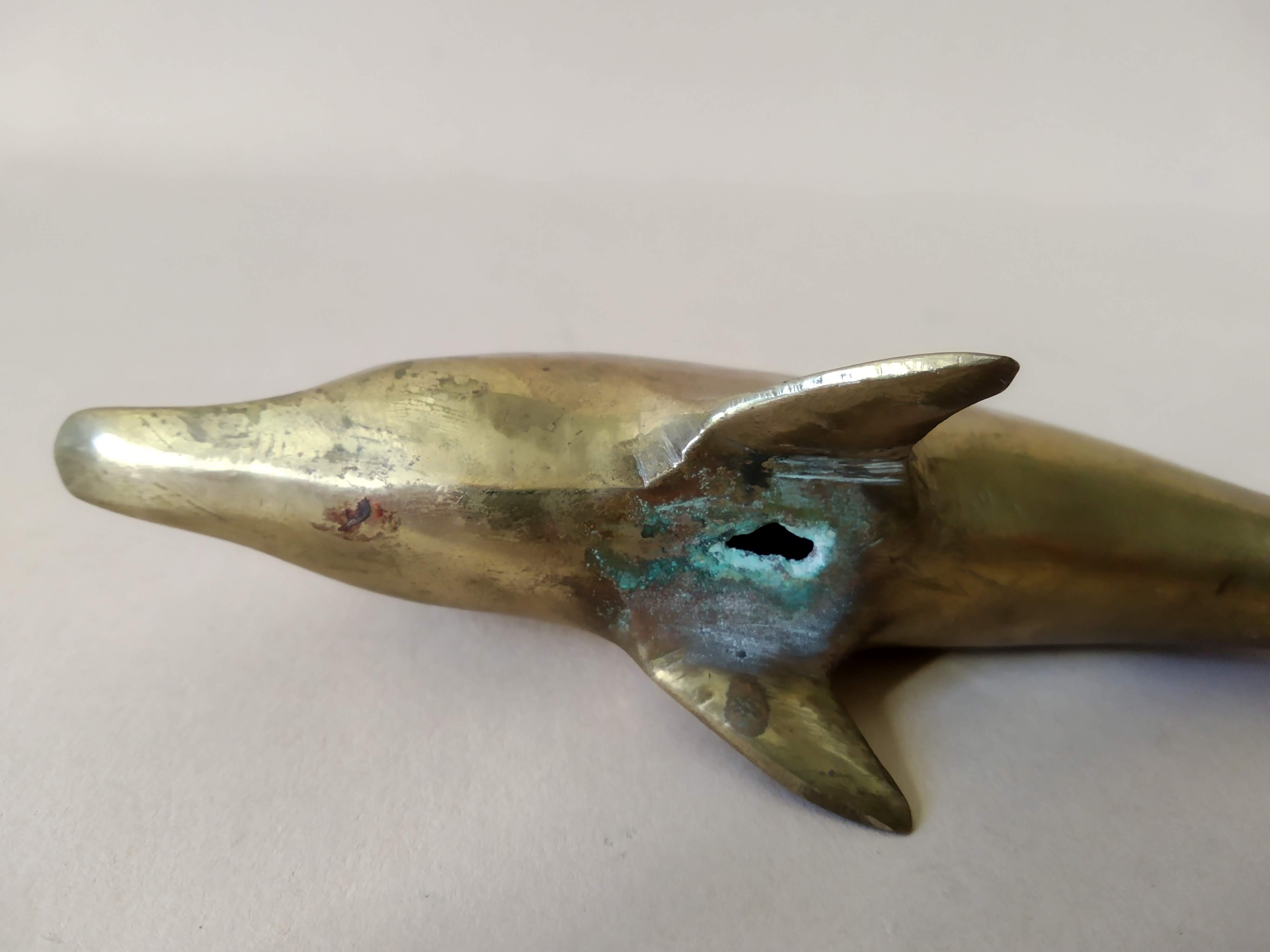 Patinated brass dolphin