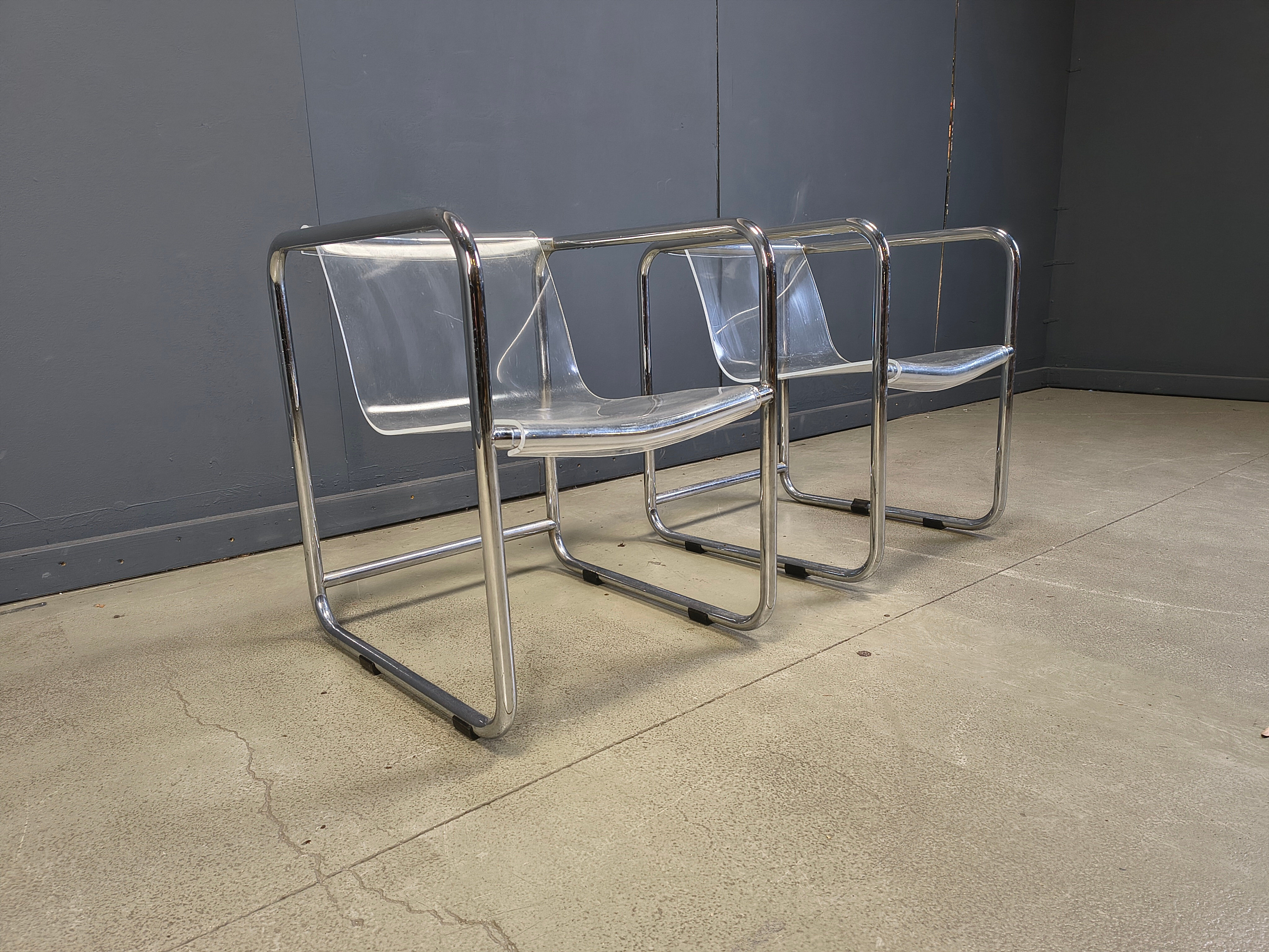 Pair of plexiglass and tubular chrome armchairs, 1970s