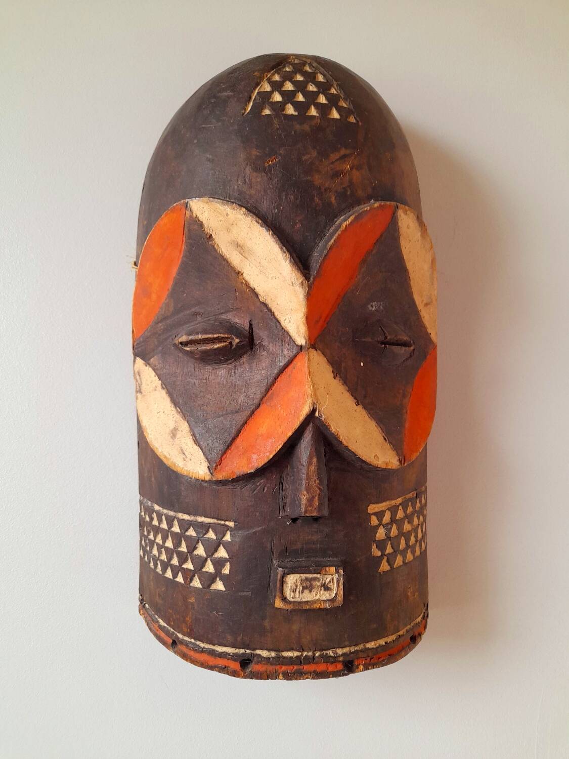 African mask carved from wood