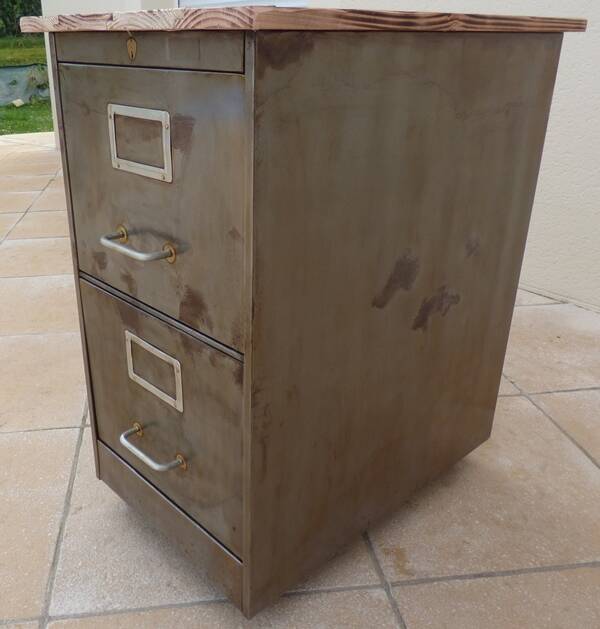 Old industrial furniture in rusty effect metal with two drawers on casters