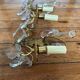 2 vintage bronze wall lights with pendants