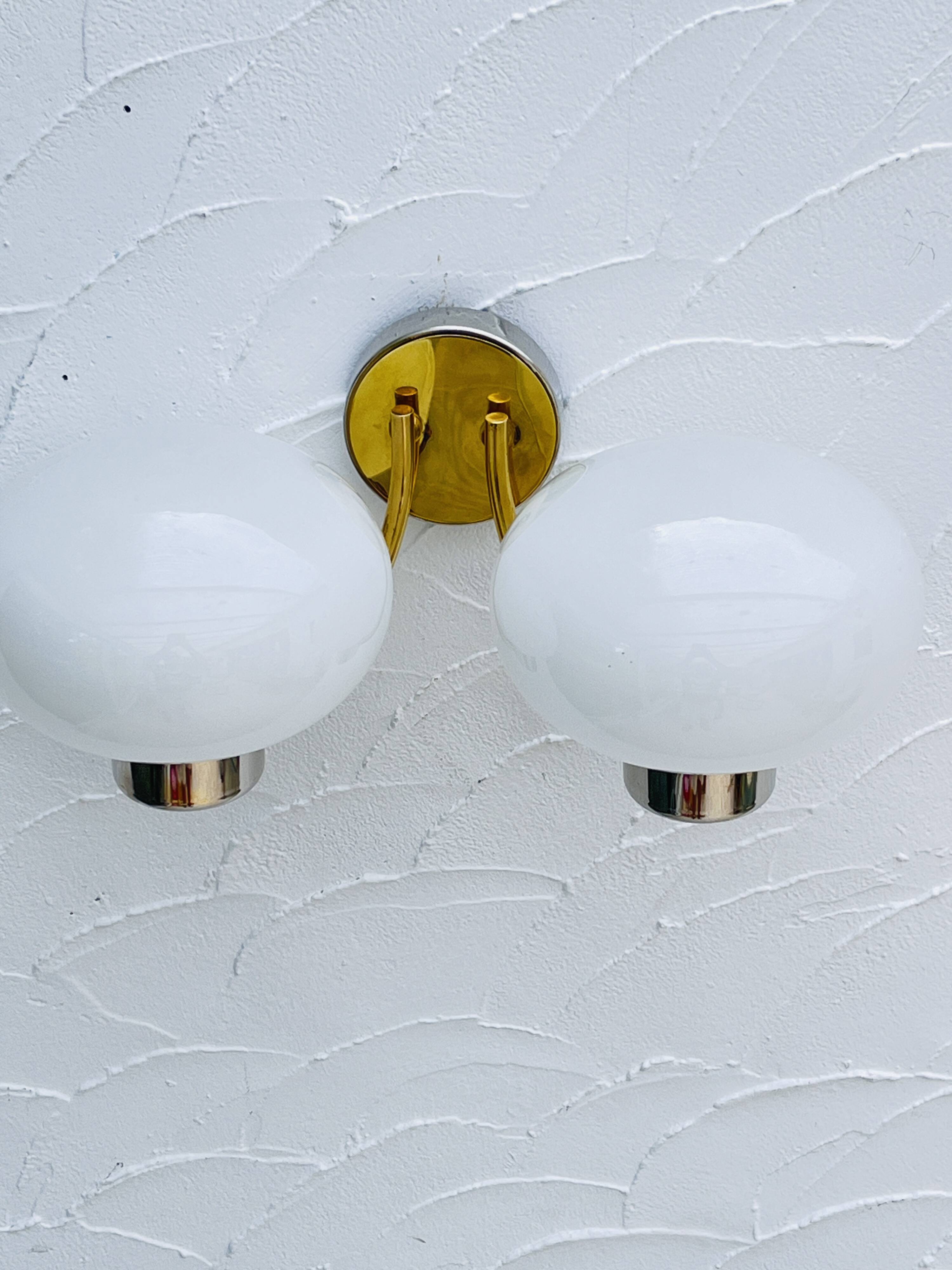 Double opaline brass wall light