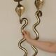 Pair of Neo-Egyptian Style Engraved Brass Wall Sconces Featuring Cobras
