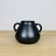 Black ceramic vase from the 1950s.
