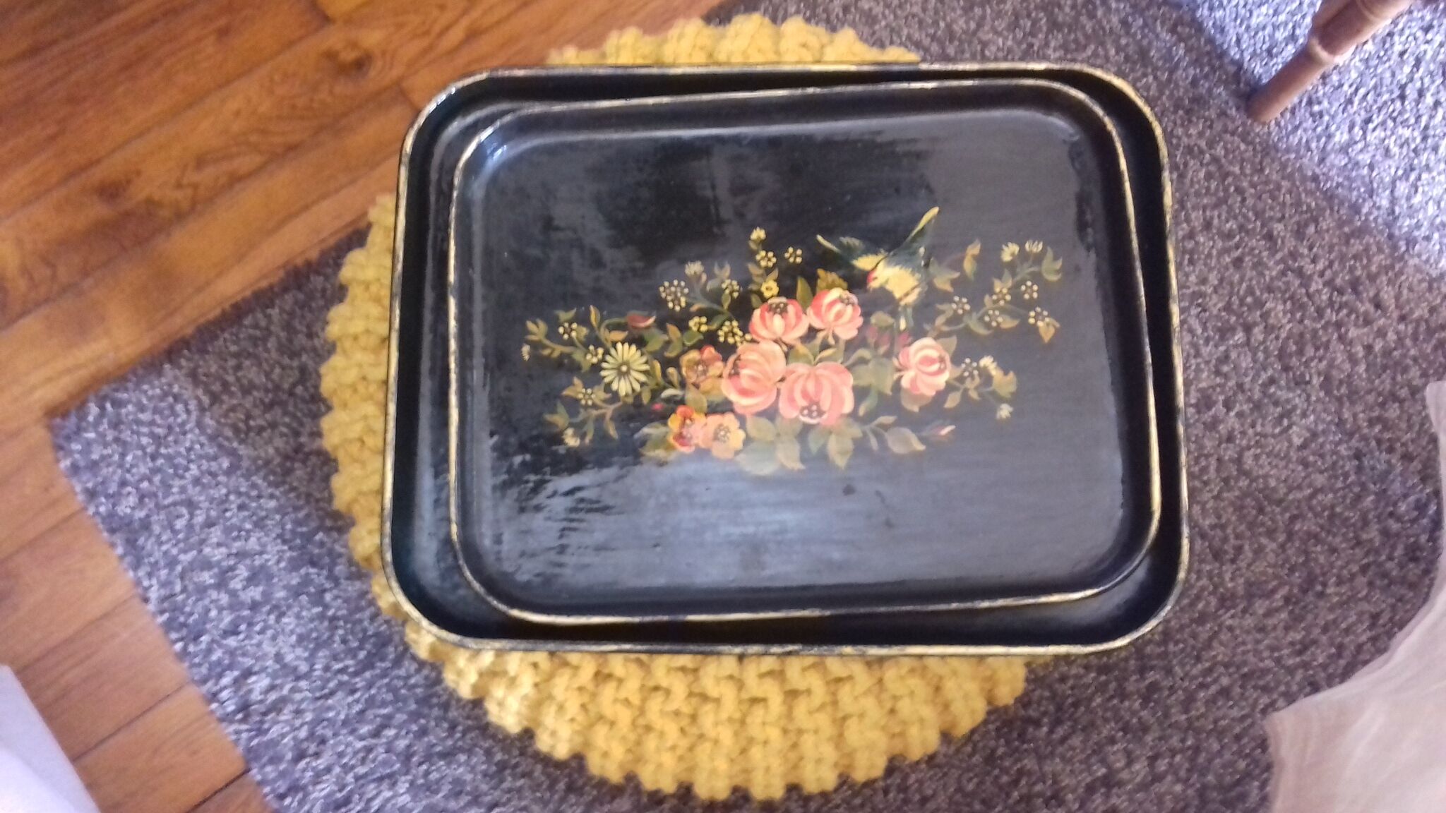Black wooden tray with gilding and Russian motifs painted with red and green flowers
