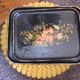 Black wooden tray with gilding and Russian motifs painted with red and green flowers