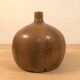 Sandstone ball vase signed Michel Dumont