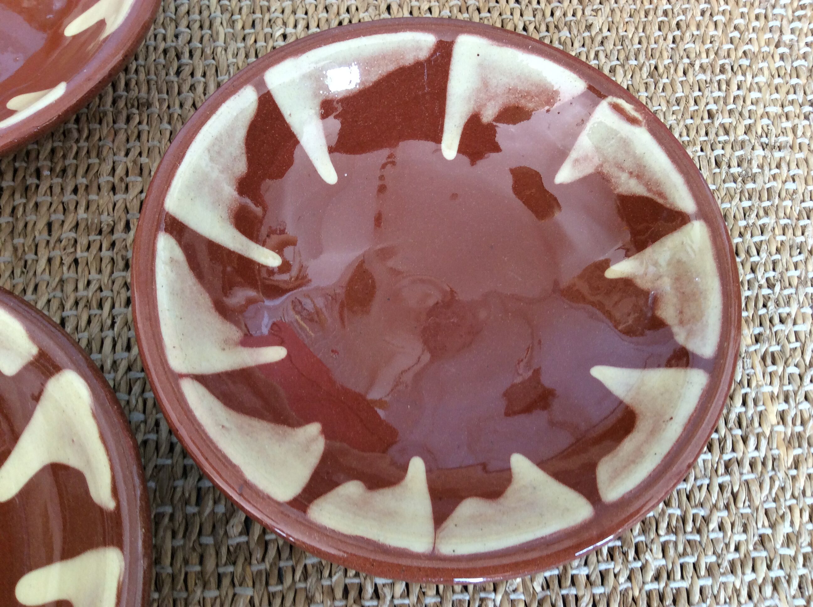 3 glazed terracotta plates