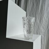 Glass vase with stylized flower pattern