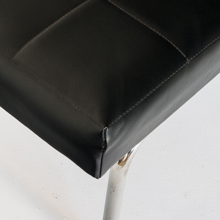 Pair of vintage low armchairs in chrome metal and skaï, Spain 1970