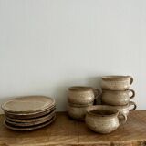 6 stoneware cups and saucers
