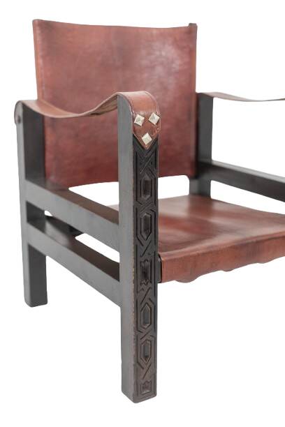 “Safari” armchair in wood and cognac leather. 1960s/70s.