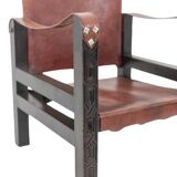 “Safari” armchair in wood and cognac leather. 1960s/70s.