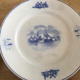Series of 11 flat plates, Dutch earthenware, early XX