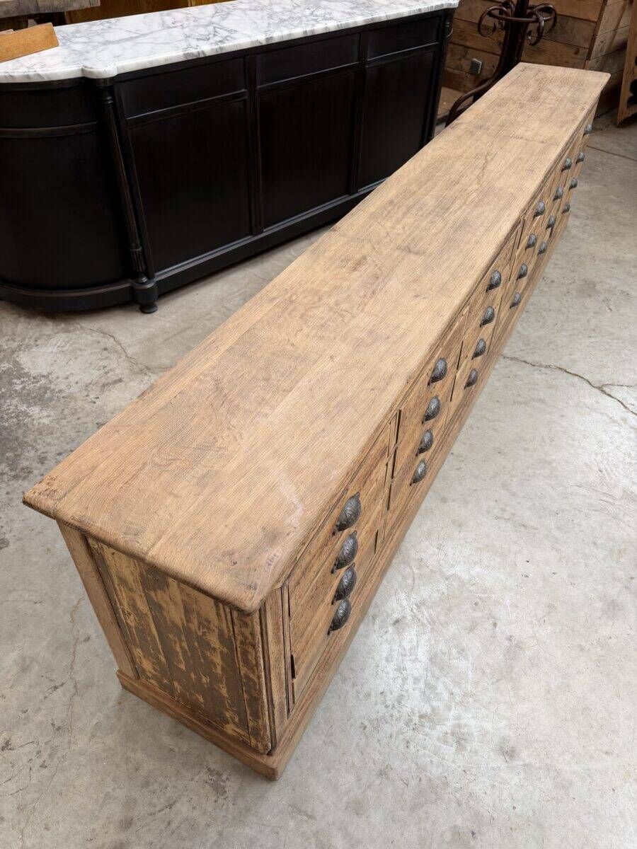 Large workshop furniture transformed into a TV unit.