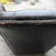 Padded chesterfield leather armchairs