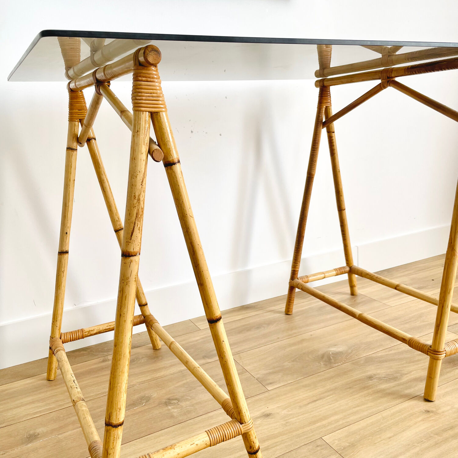 Rattan desk and smoked glass tray