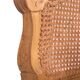 Armchair in solid oak with caning and a central leg (known as couillard), 89x68cm.