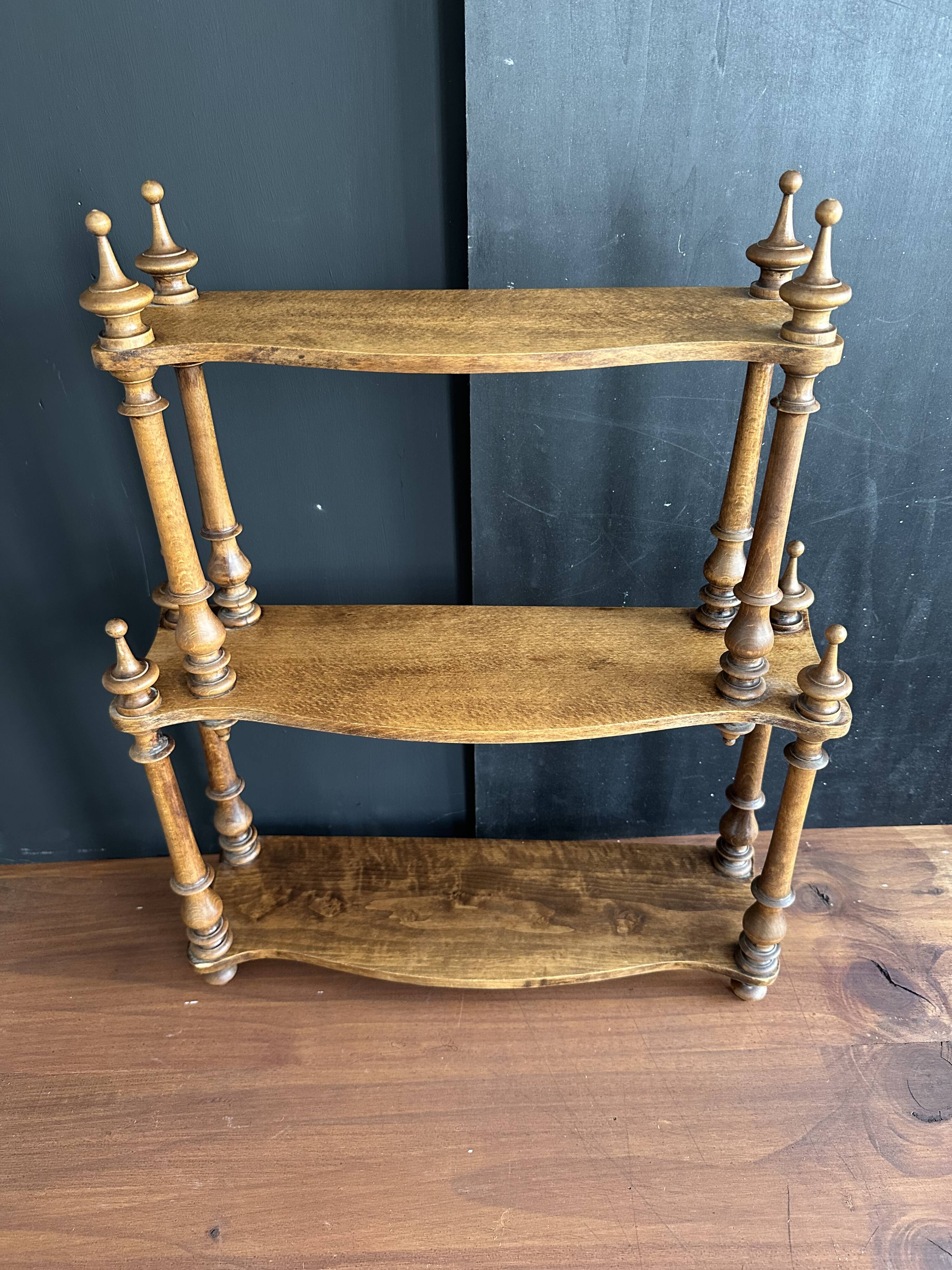 Antique turned wooden shelf with three levels, around 1900.