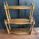 Antique turned wooden shelf with three levels, around 1900.
