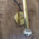 Scandinavian brass wall sconce