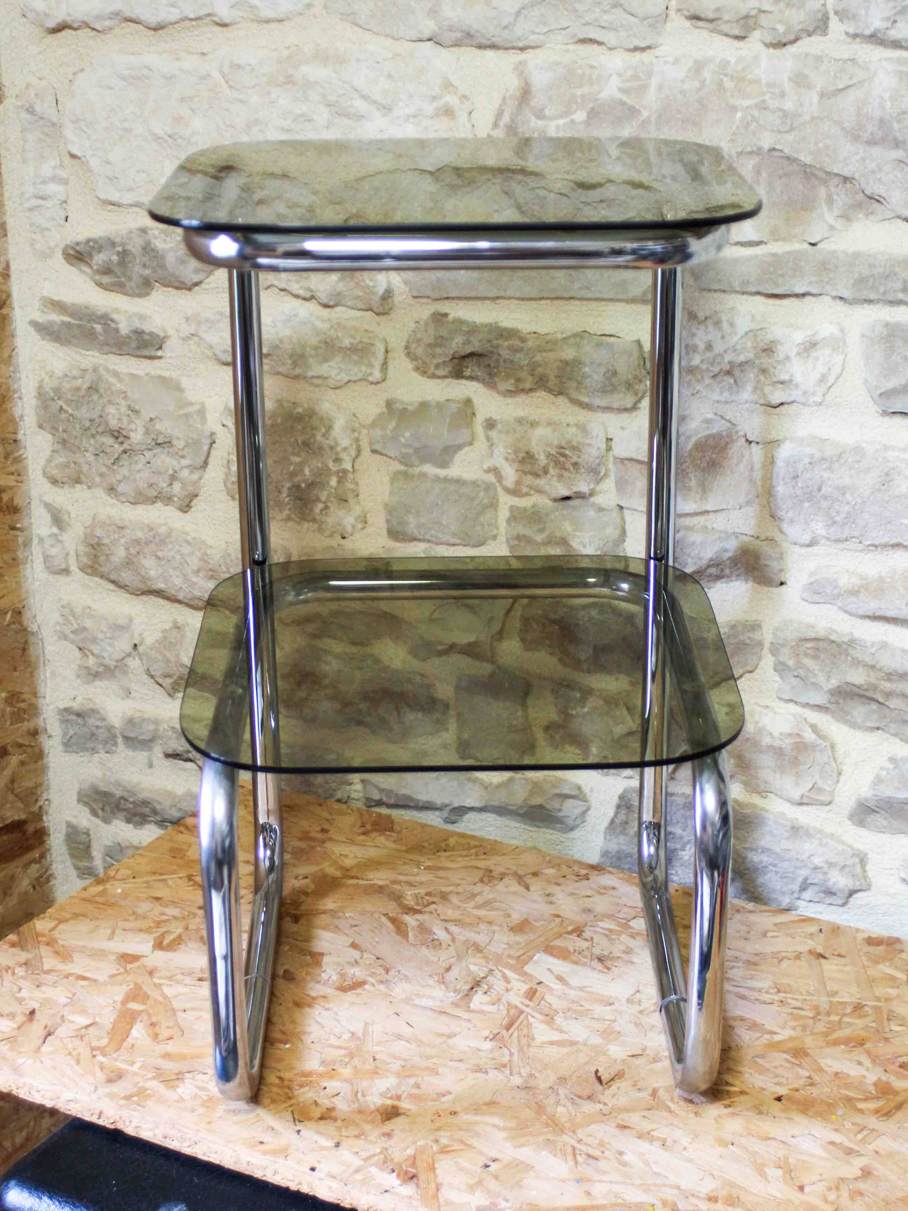 Chrome metal and smoked glass side table.