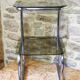 Chrome metal and smoked glass side table.