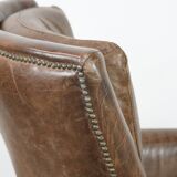 Very comfortable vintage cow leather armchair with beautiful colours
