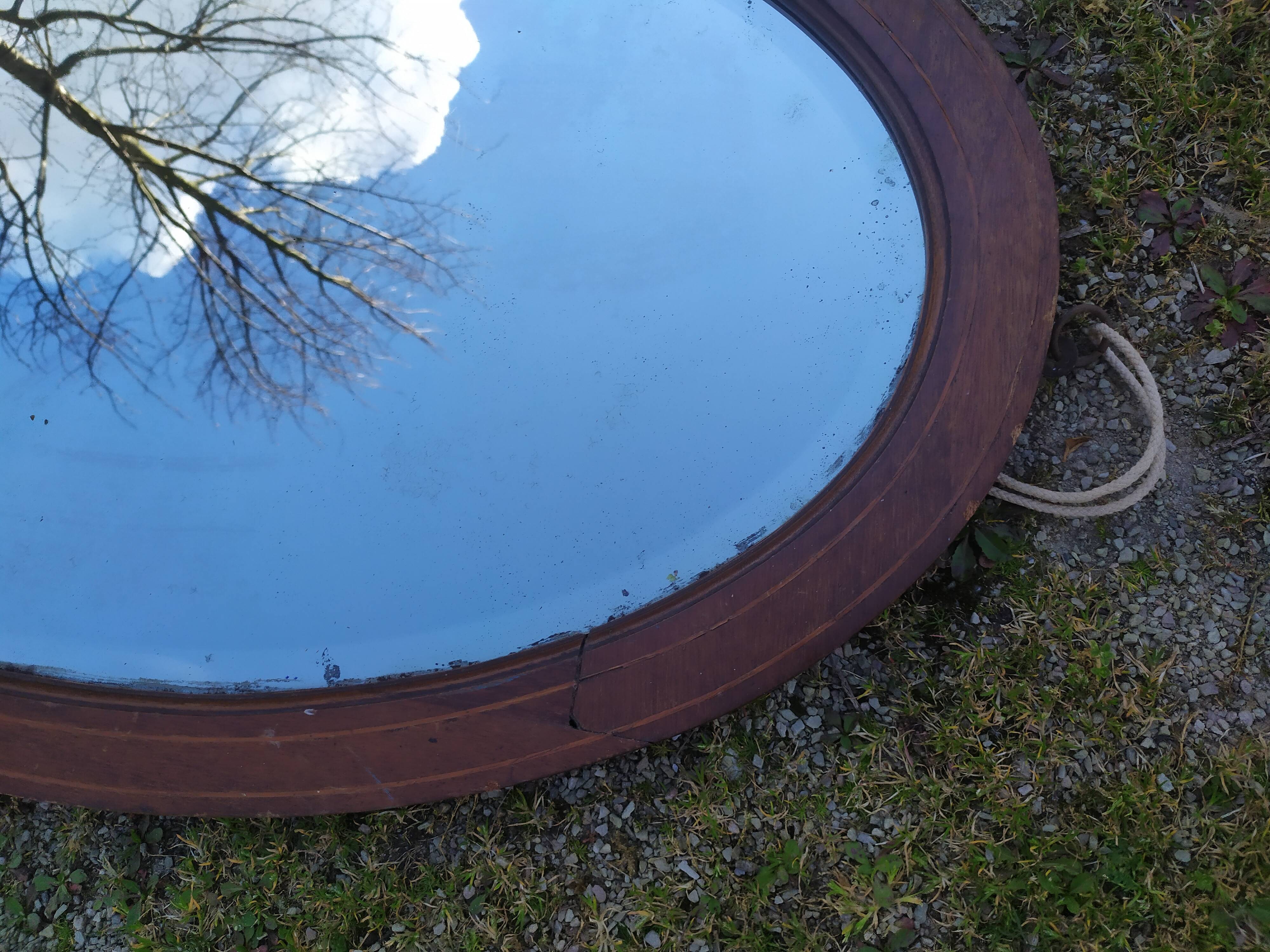 Beveled oval mirror 83x52cm